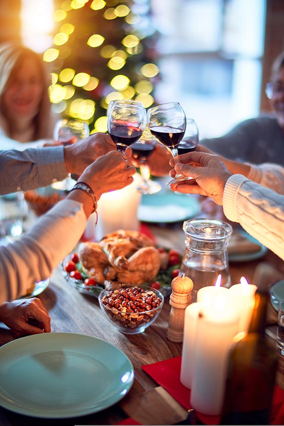 Christmas party Guests at a Christmas party clinking glasses