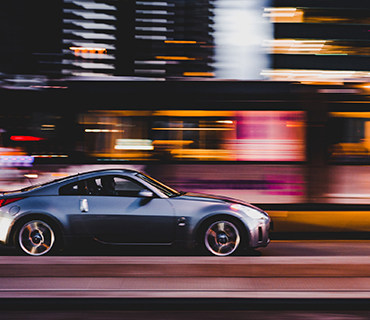 Image of speed effects visualized on a moving car Speed effects shown in an image of a moving car