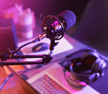 Record a podcast Close up of podcast microphone and keyboard